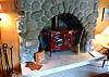 Hearthstone fireplace with woodstove insert warms the house for a cozy atmosphere.  A great place to curl up with your favorite book and enjoy the flicker of the fire.