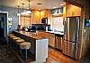 You'll love preparing your meals in this well equipped kitchen while watching the ocean waves roll into shore.  The only nostalgic charm that remains in this beautifully remodeled kitchen are the 5 bar stools (nicely recovered); great for another eating area or visiting with the "cooks" while preparing your favorite meals.