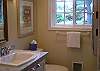 Full bath has a nice shower and stackable washer & dryer.