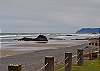 Even in the winter when the currents take away a lot of our sand and smooth cobblestone rocks appear, there's still plenty of great walking beach at low tide.  Looking North along Arch Cape beach, you can see Haystack Rock and Tillamook Head Light House on a clear day.