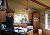 Prepare your favorite meals in this spacious, well equipped kitchen.  New refrigerator/freezer w/ice-maker installed in 2011.  Enjoy great ocean and mountain views while you cook.