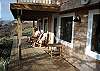 Relax in the rocking chairs or on the uniquely carved bench on the lower deck, while you listen to the ambience of ocean waves and enjoy the serene atmosphere of wooded landscape &amp; ocean views all around you.