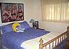 Comfortable Full sized bed in Main House has a starry ceiling and cozy starred quilt to provide a good night's sleep.
