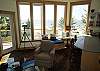 Fabulous ocean views from the spacious living room, just off the kitchen. This is just 1 flight of steps up from the entry level, where dining/sitting room w/gas fireplace, Master bedroom, Jacuzzi tub Bath &amp; Laundry area are located.