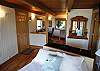 Another view of the Master bedroom and Office/Den.  Large walk-in closet with plenty of room to hang your clothes and store your suitcases.