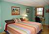 The lower level offers the master bedroom with king size bed, office space, private full size bath and laundry facilities.