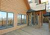 Lots of Windows and oversize deck to enjoy the mountain views. Screened porch for outside dining off kitchen.