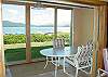 Enclosed patio - opens to common area with access to lake and pool
