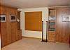 Bedroom 1 with king and twin (extra long) Murphy beds.