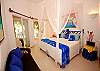Seven seas 4 guest bedroom with king bed and door to the terrace-Thumbnail