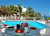 Poolside dining area.-Thumbnail