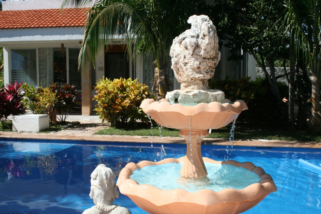 Foutain by the garden pool.-Thumbnail