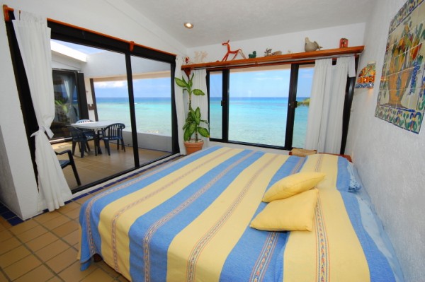 Master bedroom with ocean views plus the private terrace.-Thumbnail