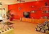 TV lounge with small library.-Thumbnail