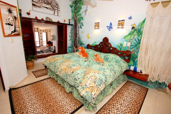 Master bedroom with king sized bed and shutters for bay views.-Thumbnail