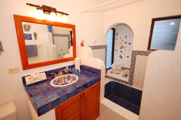 Guest bathroom with tub.-Thumbnail
