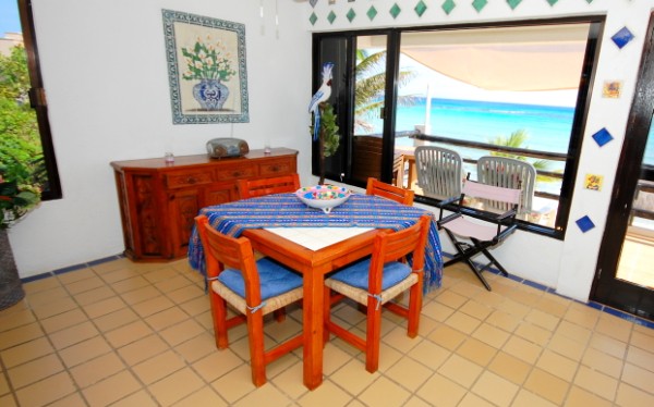 Dining area with wonderful views over the bay. Yool Caanal 3-Thumbnail
