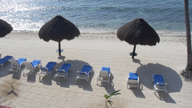 Groomed beach and palapas in front of Yool Caanal condos-Thumbnail