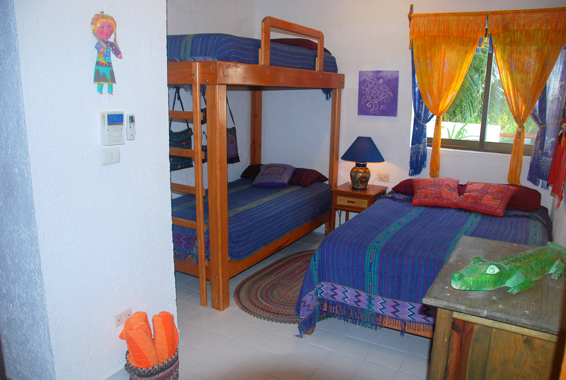 Guest Bedroom with bunk beds and a double/full bed.-Thumbnail