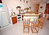 Fully equipped kitchen and breakfast bar.-Thumbnail