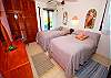 Guest bedroom with 2 single beds at Yool Caanal 3.-Thumbnail
