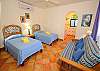 Lower guest bedroom with 2 single/twin beds and double futon.-Thumbnail