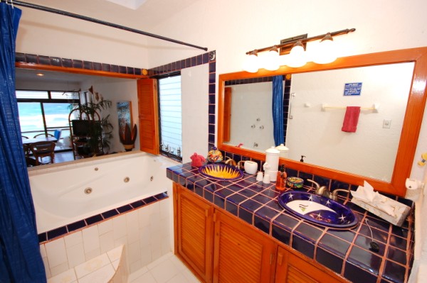 Master ensuite bathroom with double vanity and jacuzzi tub.-Thumbnail