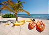 Seven Seas condos, Kayaks on South Akumal Beach-Thumbnail