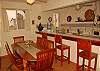 Condominium rental - Interior Photo - Dining area with kitchen view.
