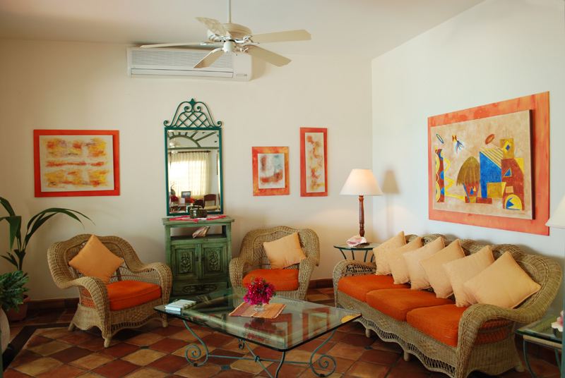 Living room with sliders out onto the pool side terrace-Thumbnail