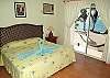 Main level guest bedroom.-Thumbnail