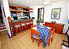 Dining and kitchen areas with breakfast bar.-Thumbnail
