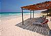 The beach directly in front of Casa de los Pelicanos with sun sh-Thumbnail