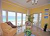 Living area with access to your private balcony with gulf views!