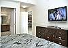 Master suite features king size bed, flat screen TV, and private full bathroom!