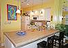 Sit at the breakfast bar to chat with the cook!