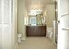 Private bath for Master king suite featuring jacuzzi tub and walk in shower!