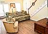 Living Room with French Doors Opening Up to Large Decks.
