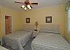 Upstairs bedroom with 2 queen beds and private bath.