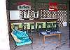 Covered party area with bar and refrigerator.  Perfect to place to keep cool right next to the pool.