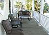 1st Level Streetside Covered Porch Overlooking Marlin Quay Marina