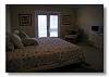 2nd floor bedroom with king bed and private bath.