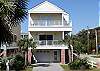 Welcome to "Beach Bum". Enjoy the ocean view from 2 covered wrap around front porches.