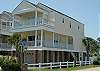 A side view of "Beach Bum" showcasing the 2 wrap around porches
