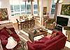 Spacious living room with flat screen tv, ocean views