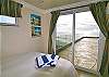 bedroom with beach front deck access