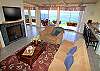Living room overlooking ocean, fireplace, flat screen tv