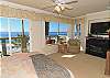 Master bedroom overlooking the ocean with fireplace, flat screen tv, ensuite bath, and large balcony