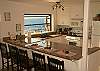 Kitchen with granite counters, overlooks ocean