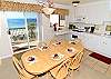 Dining room and kitchen with ocean views